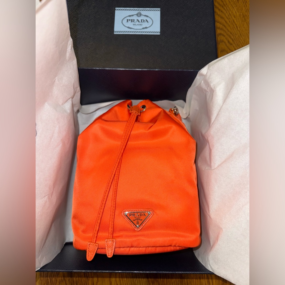 NEW WITH TAGS/IN BOX Prada Re-Edition 1978 Re-Nylon Mini Bucket Bag in Orange